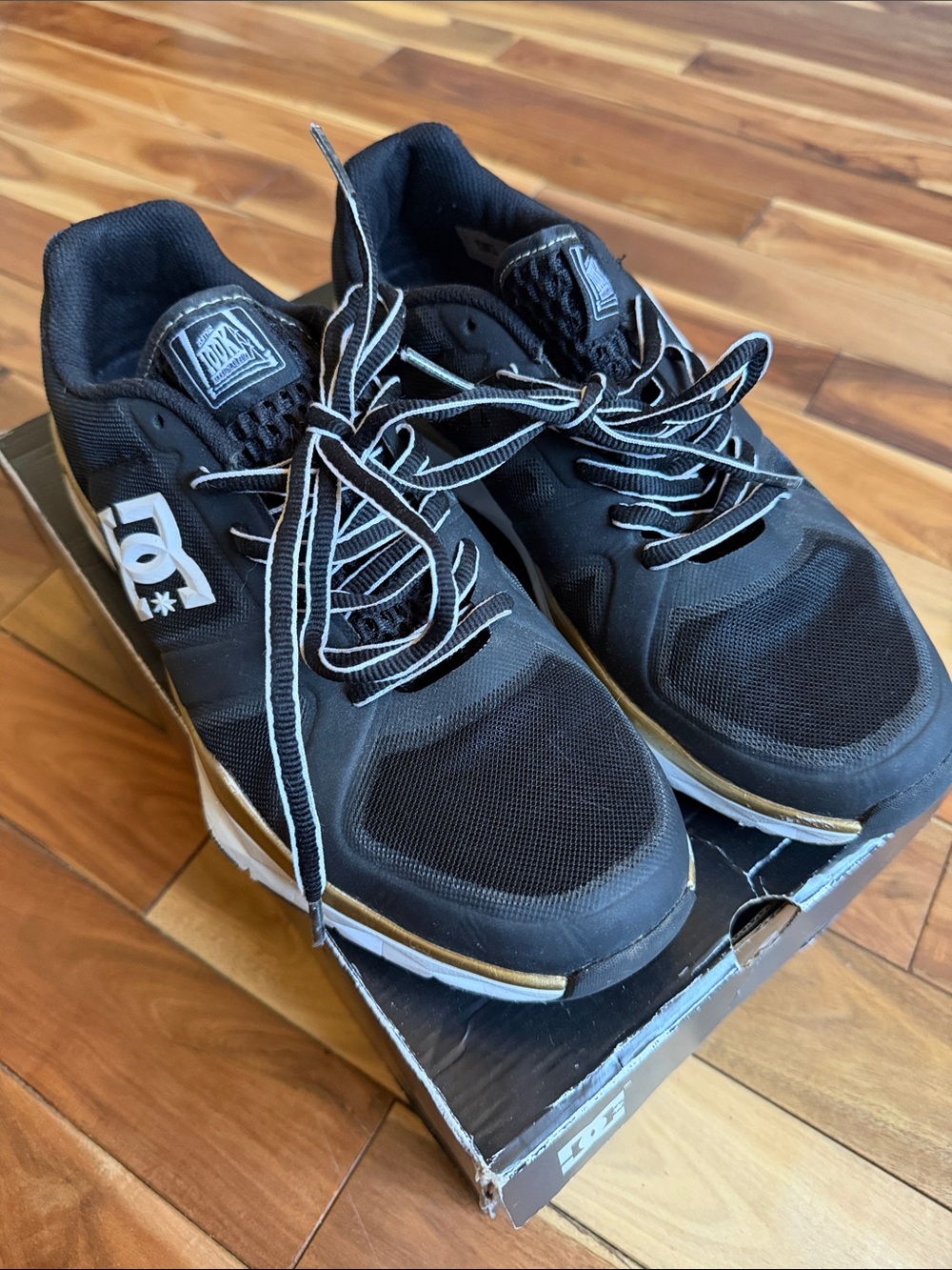 DC Men's Black Athletic Sneakers with White Accents zumiez 100k employee shoe